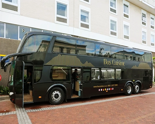 Bus Cuisine offers a seat at Cape Town’s most exclusive moving table—where fine dining meets breathtaking travel.