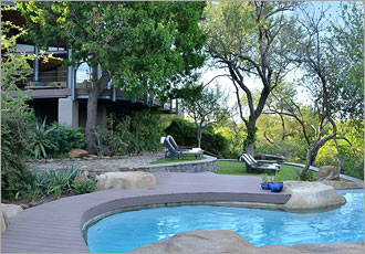 Laze by the pool and work on your bush tan